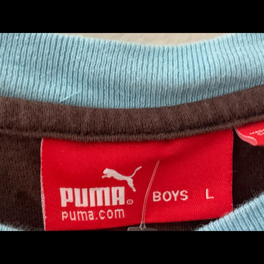 brown and blue Puma long sleeve tee